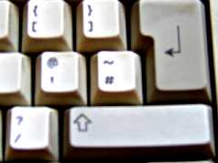 [Key layout on a British PC keyboard: <shift>-apostrophe gives a @]